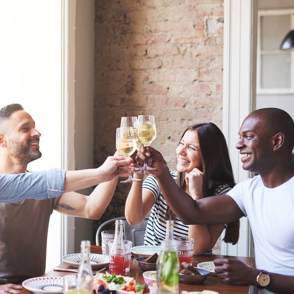 A group of people toasting