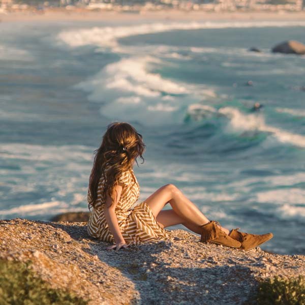 Woman sitting on a beach
